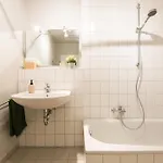 & Coliving Apartmanhotel